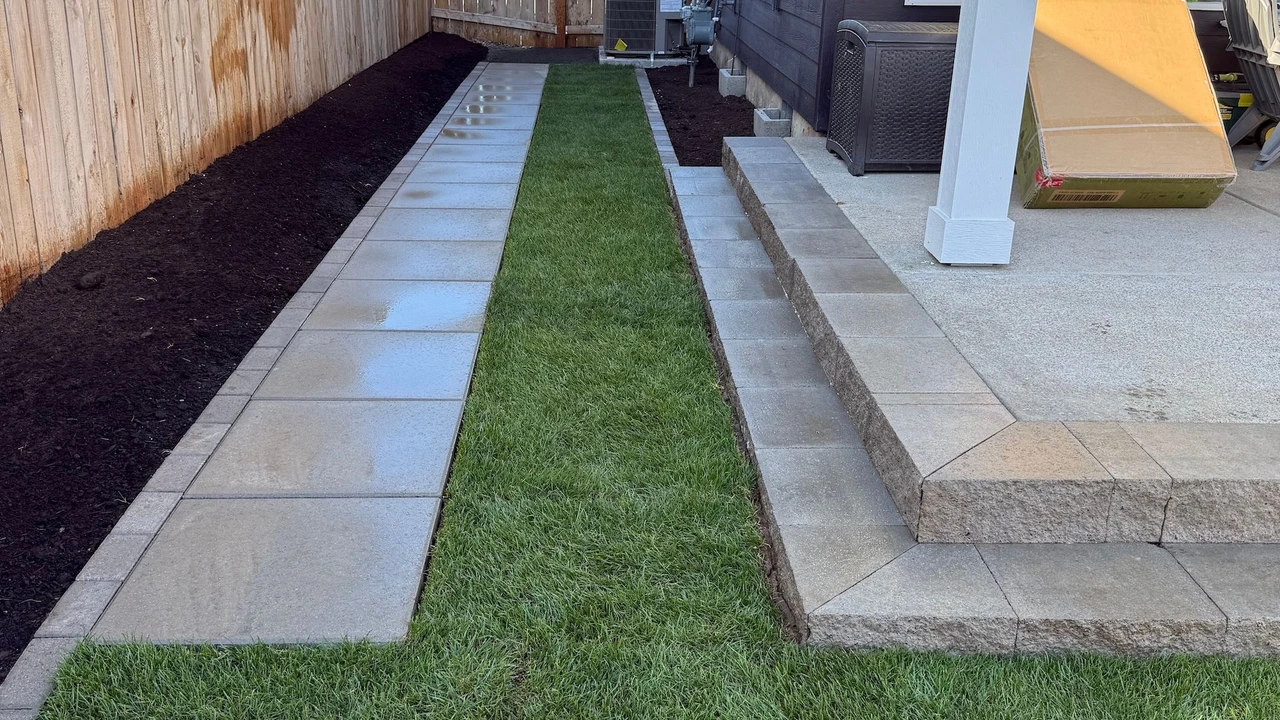 installed sod with paver trim and new fencing