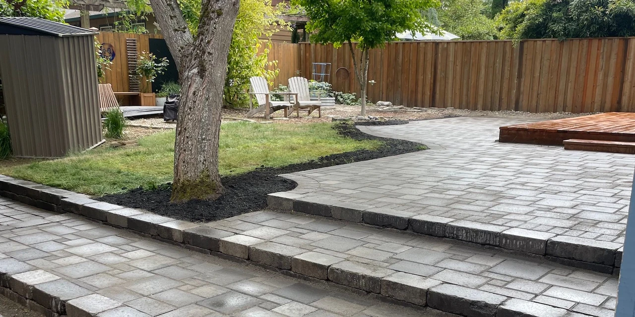 Paver patio set in layers to follow the inclined landscape