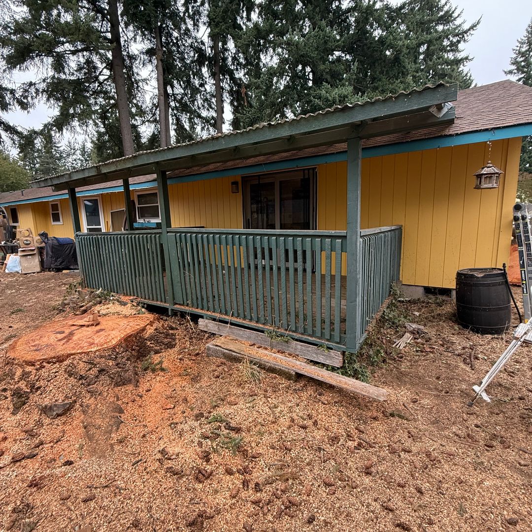 Yellow house with covered patio