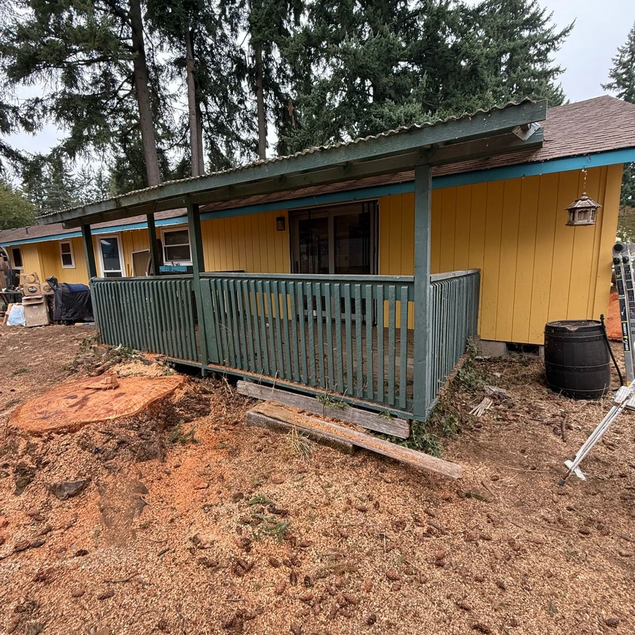 Yellow house with covered patio